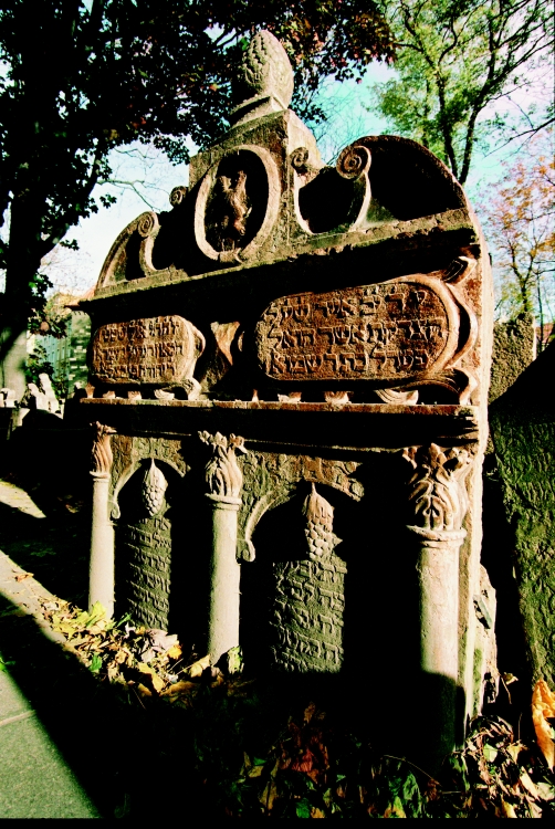 Ornate Renaissance tombstone with Hebrew inscription in Prague's Old Jewish Cemetery