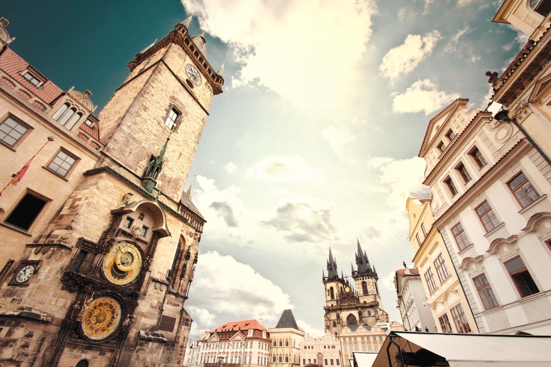 Prague Old Town Square with the Old Town Hall tower, astronomical clock and Týn Church spires